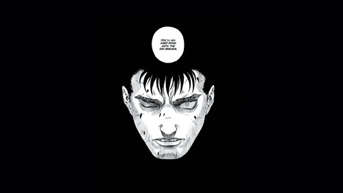 a black and white comic book page of a man's face.jpg