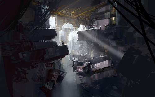 a man standing in a room with many machines.jpg