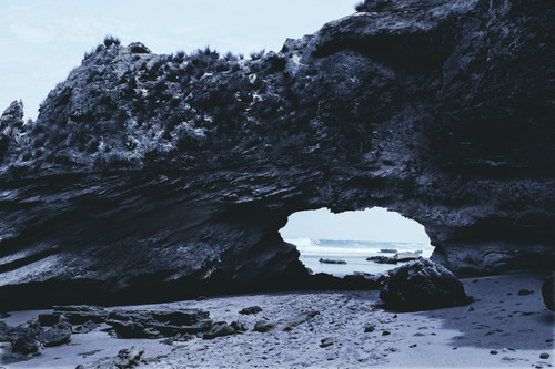a rock formation with a hole in the middle.jpg