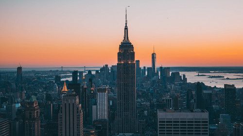 a city skyline with a tall building.jpg