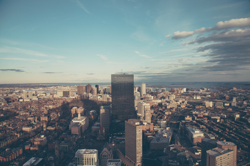 a city with tall buildings and water in the background.jpg