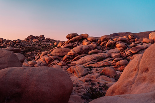 a large rocks in a desert.jpg