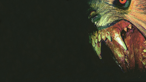 a close up of a monster's face.png