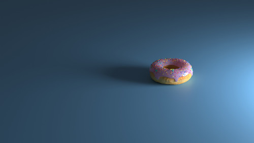 a donut with sprinkles on top.jpg