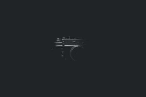 a camera with a black background.jpg