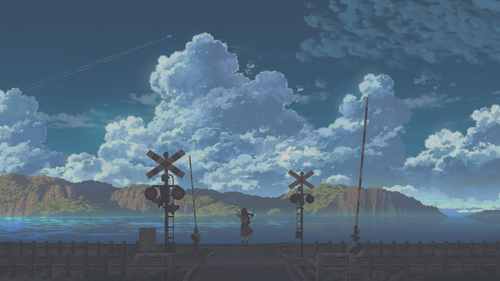 a girl standing on a railroad crossing.png