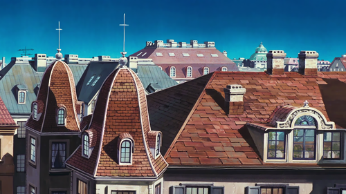 a group of rooftops with a cross on top.png