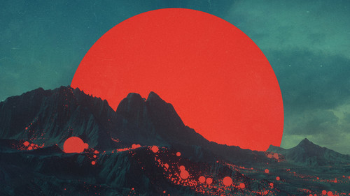 a red sun over mountains.jpg