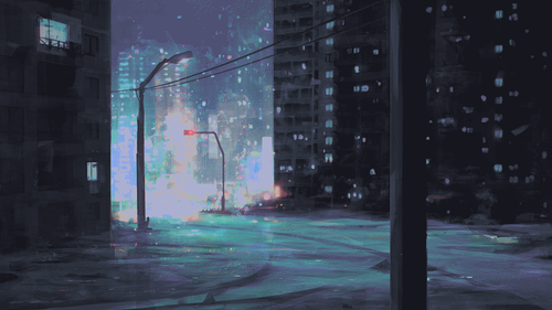 a street lights and buildings at night.png