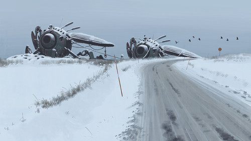 a snow covered road with two large machines.jpg