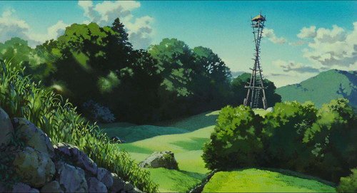 a landscape with a tall tower and trees.jpg