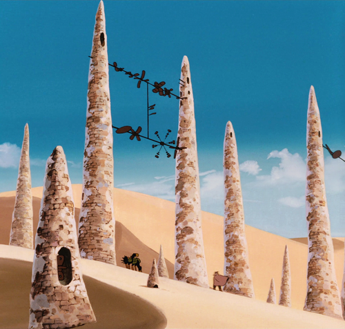 a group of tall trees in a desert.png