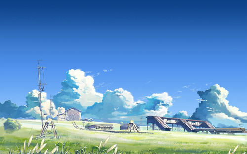 a landscape with buildings and clouds.jpg