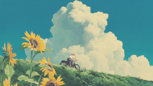 a person riding a bicycle on a hill with sunflowers.jpg