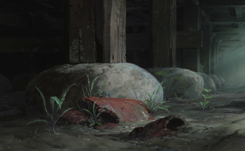 a rock and grass in a dark room.png