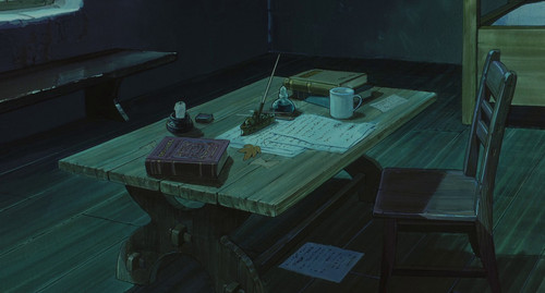 a table with papers and a pen on it.jpg
