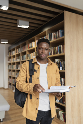 young student learning library.jpg