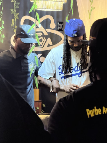 Men's Village Circle attendees sharing resources