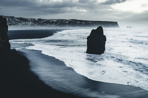 Sunrise at famous Black Sand Beach Reynisfjara in Iceland Windy Morning Ocean Waves.jpg