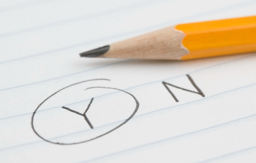 Pencil with "Y" Circled For Yes --- Image by  Royalty-Free/Corbis.jpg