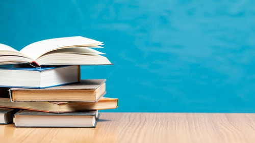 front view pile books with copy space 23 2148255821.jpg