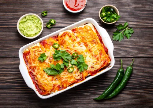 Baked Cheesy Chicken Enchiladas With Hatch Green Chiles.webp