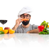 Crazy hipster chef with carrot like moustache