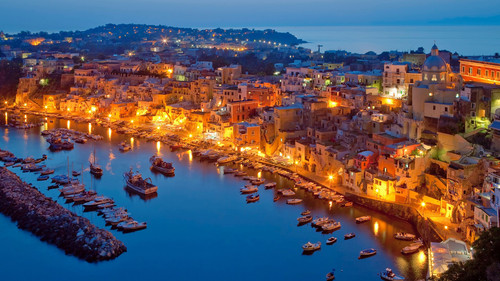 Marina Corricella on Procida Island at dusk, Bay of Naples, Campania, Italy 1080p