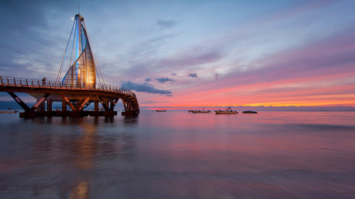 Moonrise and sunset over the pier on Los Muertos Beach, Puerto Vallarta, Mexico 1080p.jpg