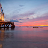 Moonrise and sunset over the pier on Los Muertos Beach, Puerto Vallarta, Mexico 1080p