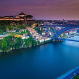 Old Town skyline across the Douro River and The Luis Bridge, Porto sunset, Portugal 1080p