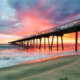 Footprints in the beach sand under a pier, Hermosa Beach, Los Angeles, California, USA 1080p