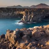 Lava cliffs and volcano skyline, Timanfaya National Park, Lanzarote, Canary Islands, Spain 1080p