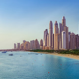 Beach with boats near Dubai Marina with view on the skyline, UAE 1080p