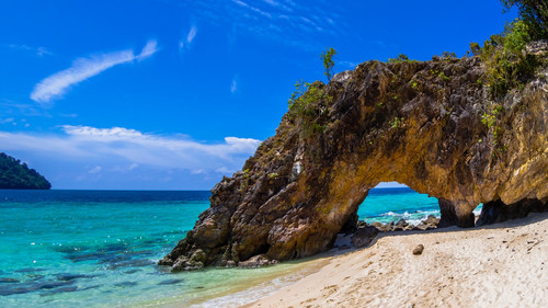 Stone arch with beautiful beach, Koh Lipe in Satun, Thailand 1080p.jpg