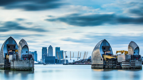 Thames Barrier on River Thames and Canary Wharf in the background, London, England, UK 1080p.jpg