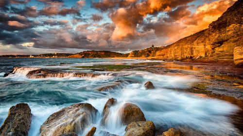 Sunrise over the northern rockshelf at Turimetta beach, Sydney, Australia 1080p.jpg