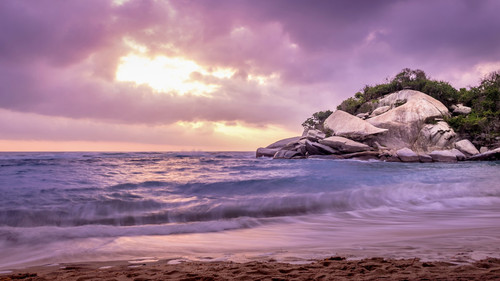 Tropical beach at sunrise, Tayrona Natural National Park, Colombia 1080p.jpg