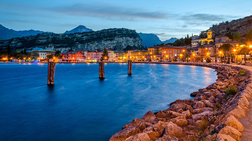 Town of Torbole at early morning, Lake Garda (Lago di Garda) at twilight, Trentino, Italy 1080p