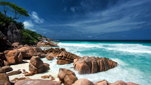 Waves and granite rocks on a paradise beach, La Digue, Seychelles Islands 1080p.jpg
