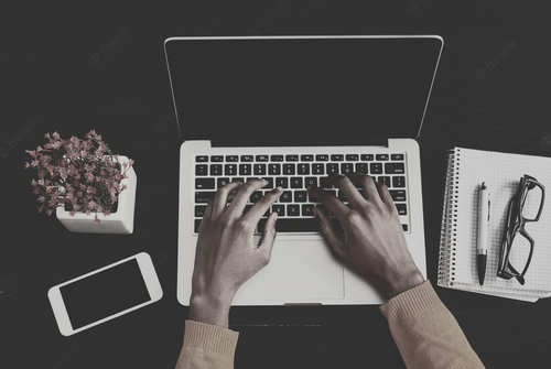 african american female hands working laptop top view black woman working office desktop with smartp.png