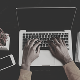 african american female hands working laptop top view black woman working office desktop with smartp