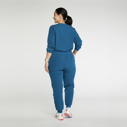 Alpine Dolman ¾ Sleeve 2 Pocket CORE Scrub Top Caribbean Blue 2500x2500 Back.jpg