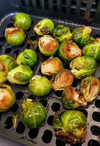 dterox a photo of brussel sprouts being fried in an airfryer 9fcbdbee 01f2 4b73 a2de 9194f335ed50 1.png
