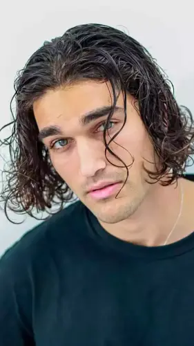 8. Curly Surfer.webp
