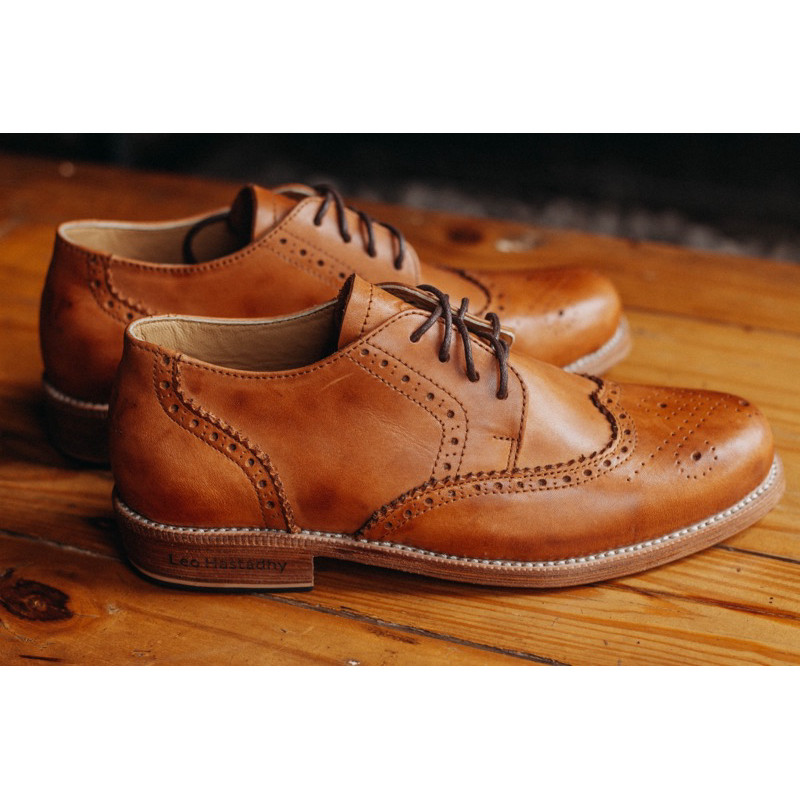 A pair of brown leather shoes