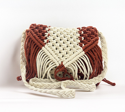 Themaresse: Handcrafted Boho Bags & Metallic Clutches for Unique Style.jpg