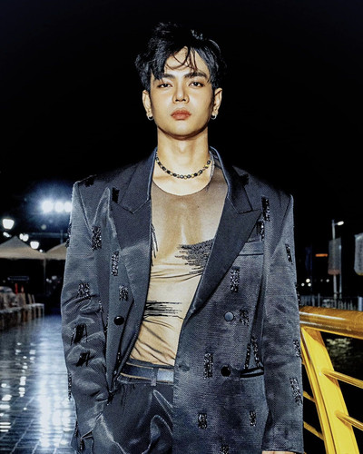 Photo by Huỳnh Sang on September 20, 2024. May be an image of 1 person, overcoat and text..jpg