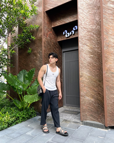 Photo by gap .jakarin puribhat on September 12, 2024. May be an image of 1 person, tanktop and sweat.jpg