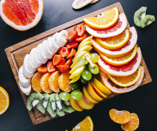 fruit platter with mixed sliced fruits.jpg